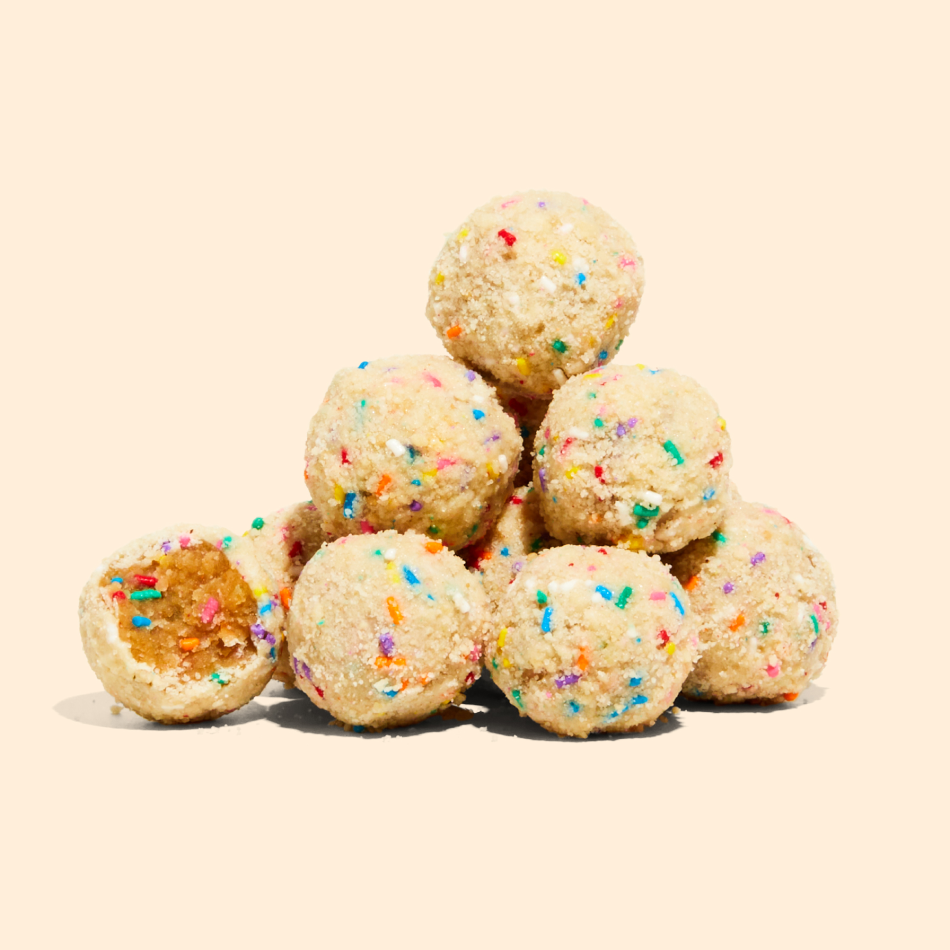 A pile of gluten-free birthday cake truffles.