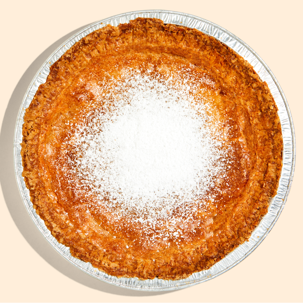 Overhead view of a whole milk bar pie.