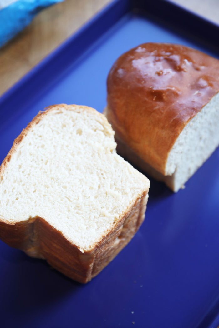 Overhead shot of a loaf of bread split in half