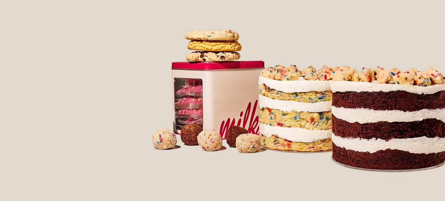An array of Milk Bar treats including cookies, cakes, and cake truffles