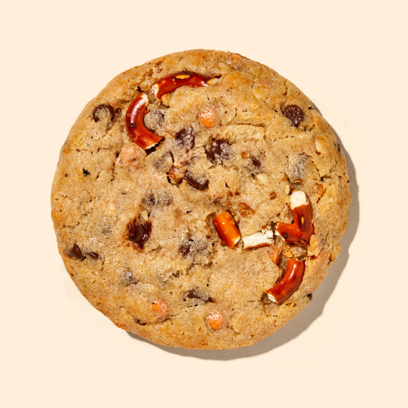 overhead of the compost cookie, which contains pretzels, potato chips, coffee grounds, chocolate chips, and butterscotch chips.