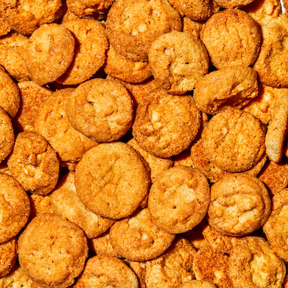overhead macro view of a large pile of vanilla butter crunch super crunchy cookies