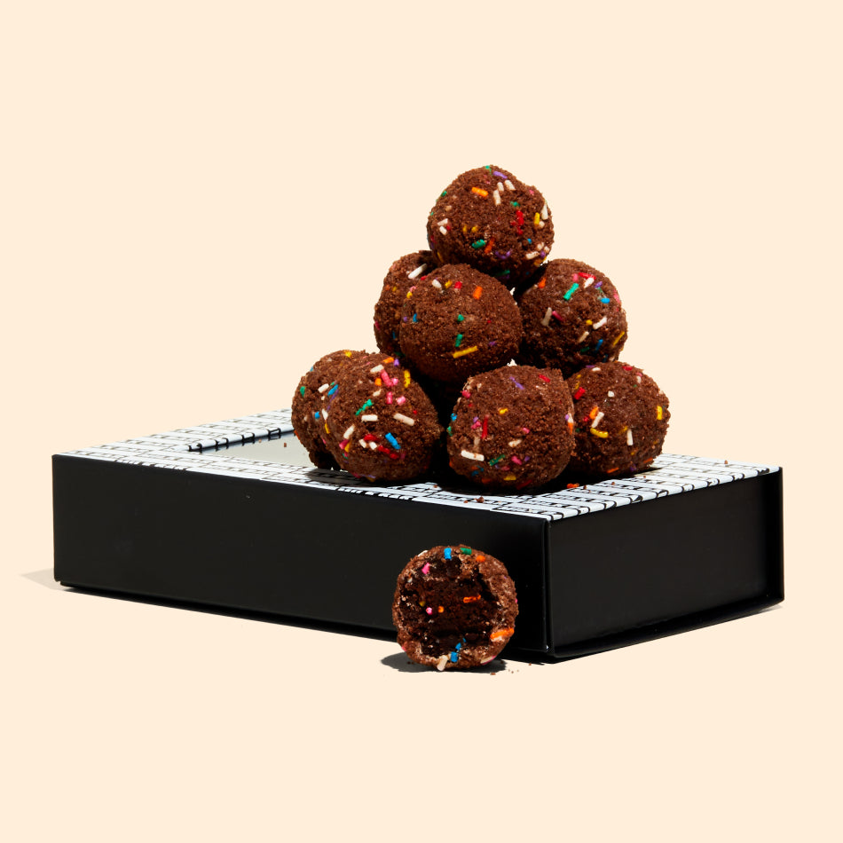 Chocolate B'Day Truffle Dozen Box with truffles on top.