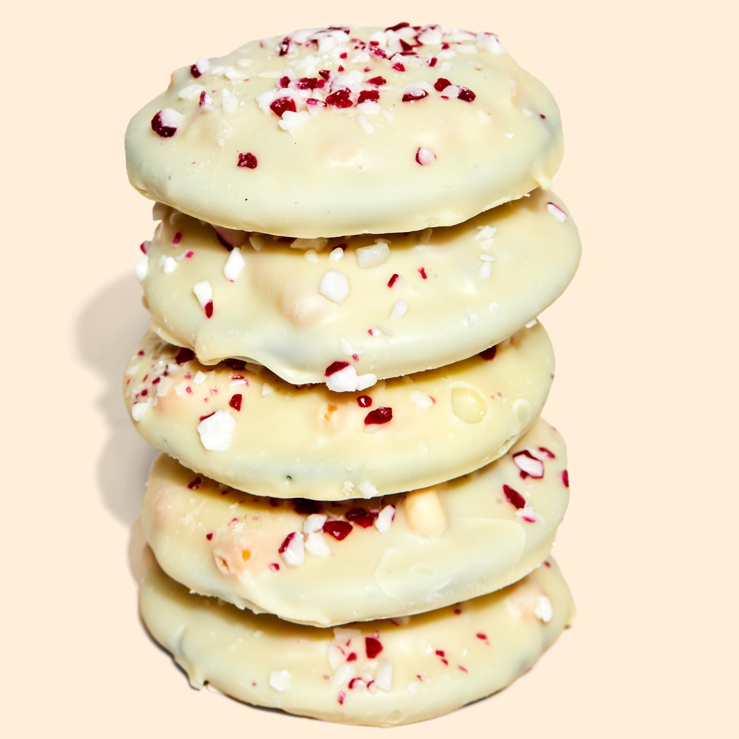 A stack of mini peppermint bark snap cookies